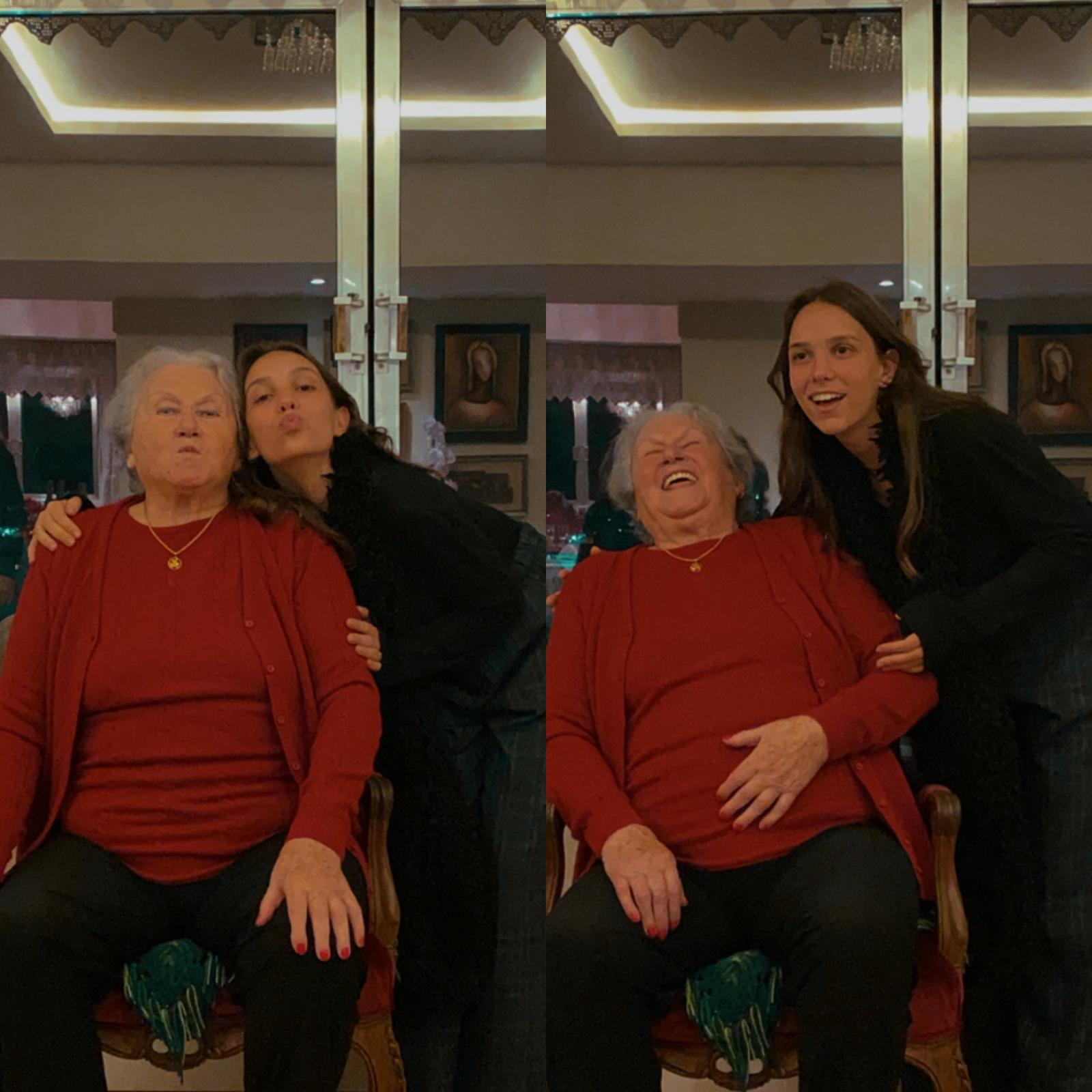 A two-panel photograph of Aurora Carlin Martini with an older woman in a red cardigan seated in a carved chair in a living room, laughing in the second frame.