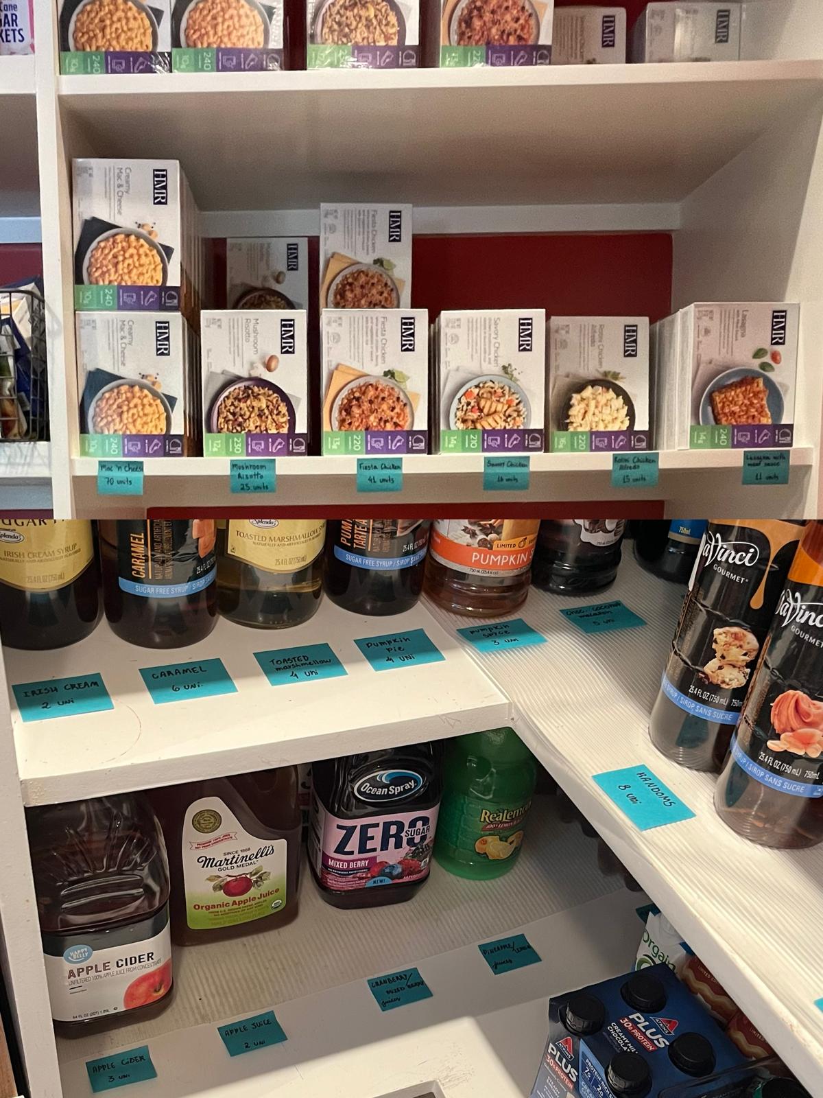 Pantry shelves of packaged meals, syrup bottles and juices, each position marked with a handwritten label giving the item and a unit count.